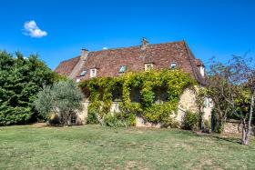 Large charming property divided into five houses for sale