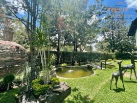 House in private gated community overlooking the golf course and lake