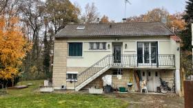 Old house in the middle of the forest in a chic area on a large, quiet lot