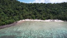 Palm lined private beach front, zoned development - elevated views and superior corals