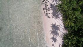 Palm lined private beach front, zoned development - elevated views and superior corals