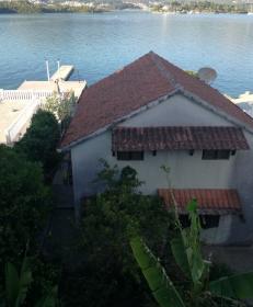 New and old houses on the seashore in Montenegro