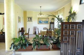Three-story villa set in an olive grove