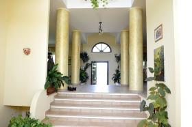 Three-story villa set in an olive grove