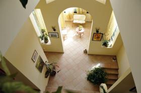 Three-story villa set in an olive grove