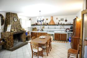 Three-story villa set in an olive grove