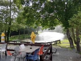 Fully fenced and secure building with pond