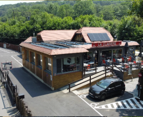 Fully fenced and secure building with pond
